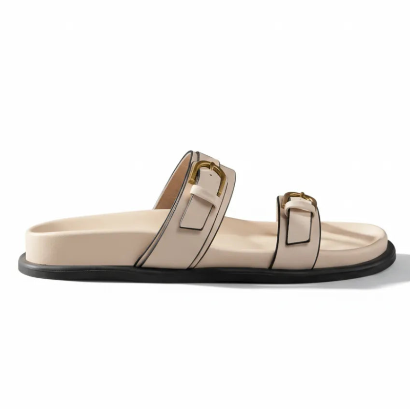 Papete branca com dupla fivela dourada vista de lado.