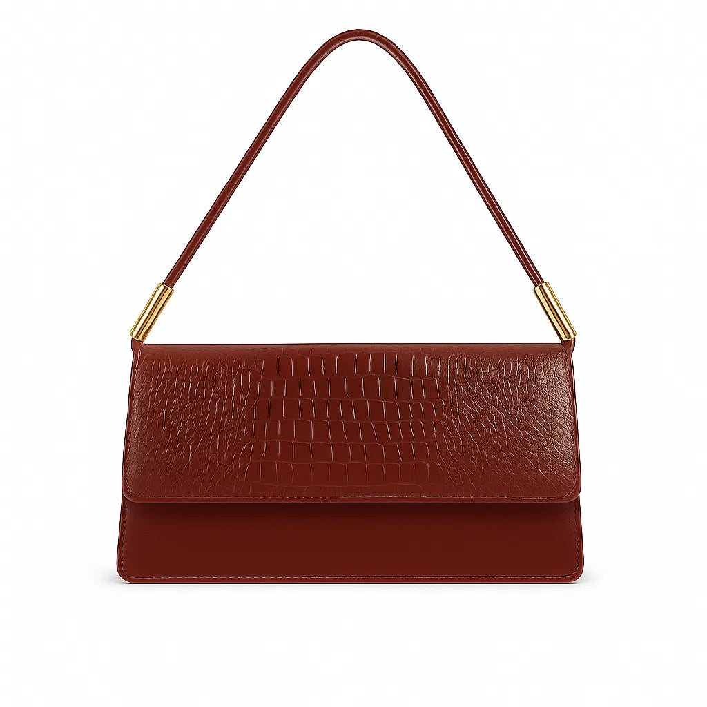 Bolsa de ombro feminina marrom com estampa de crocodilo da Rozze. Vista frontal em estúdio, destacando o design baguette, a alça superior fixa e o fechamento magnético.