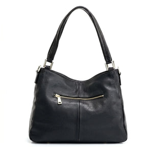 Bolsa hobo couro genuíno preta retrô vista por trás, com estrutura, costuras e acabamento posterior, sobre fundo claro
