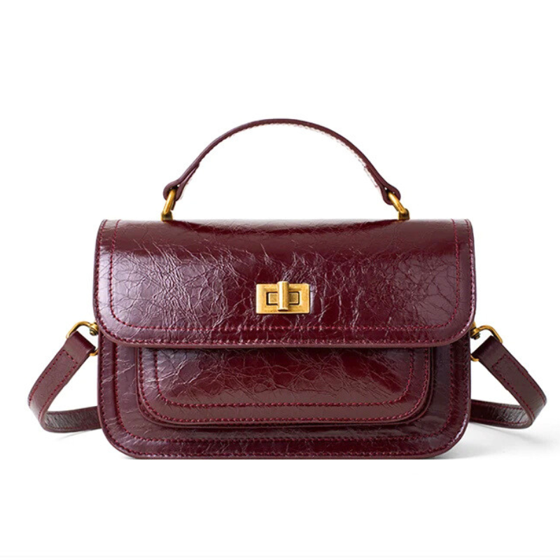 Bolsa crossbody feminina couro vinho Rozze vista de frente, acessório elegante.