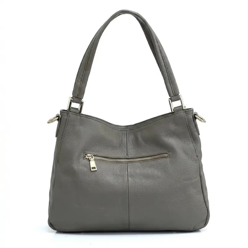 Bolsa hobo couro genuíno cinza retrô em vista frontal, com formato, alça e ferragens visíveis, sobre fundo claro