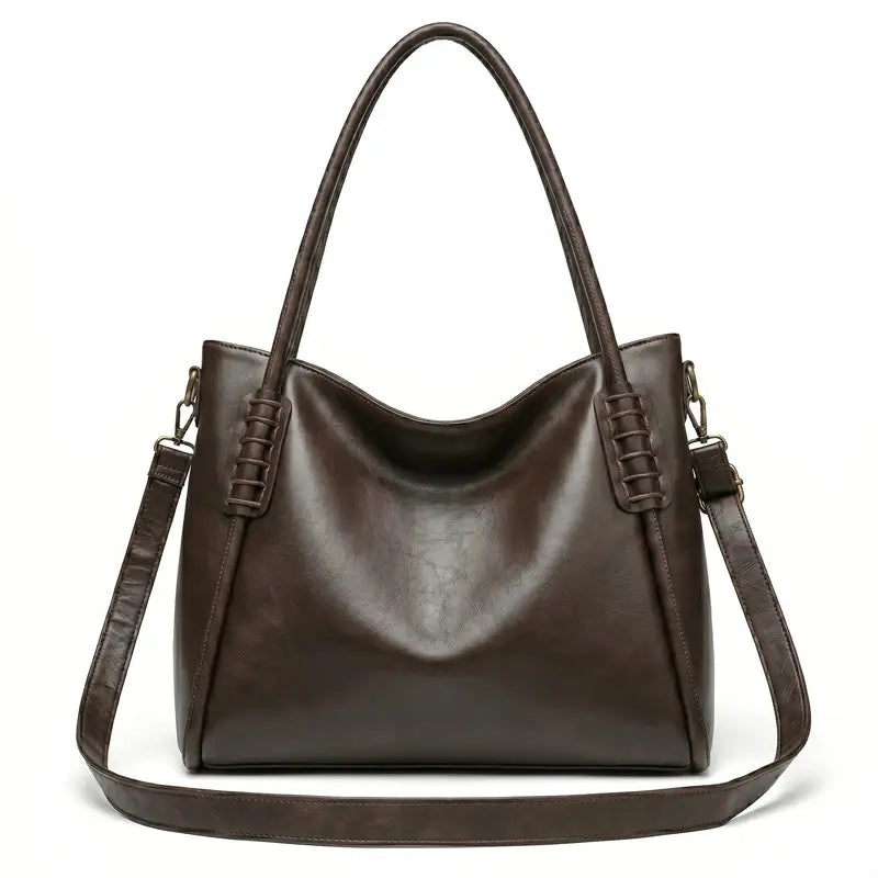 Bolsa hobo vintage marrom café em vista frontal, com formato, alça e ferragens visíveis, com acabamento uniforme