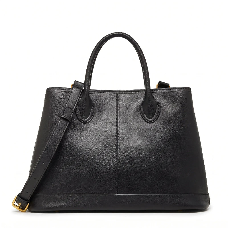 Bolsa shopper feminina preta em couro legítimo em vista principal, destacando formato amplo, alças e acabamento do couro.