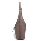 Bolsa tote feminina damasco em couro legítimo aberta por cima, com forro, zíper e compartimentos internos visíveis