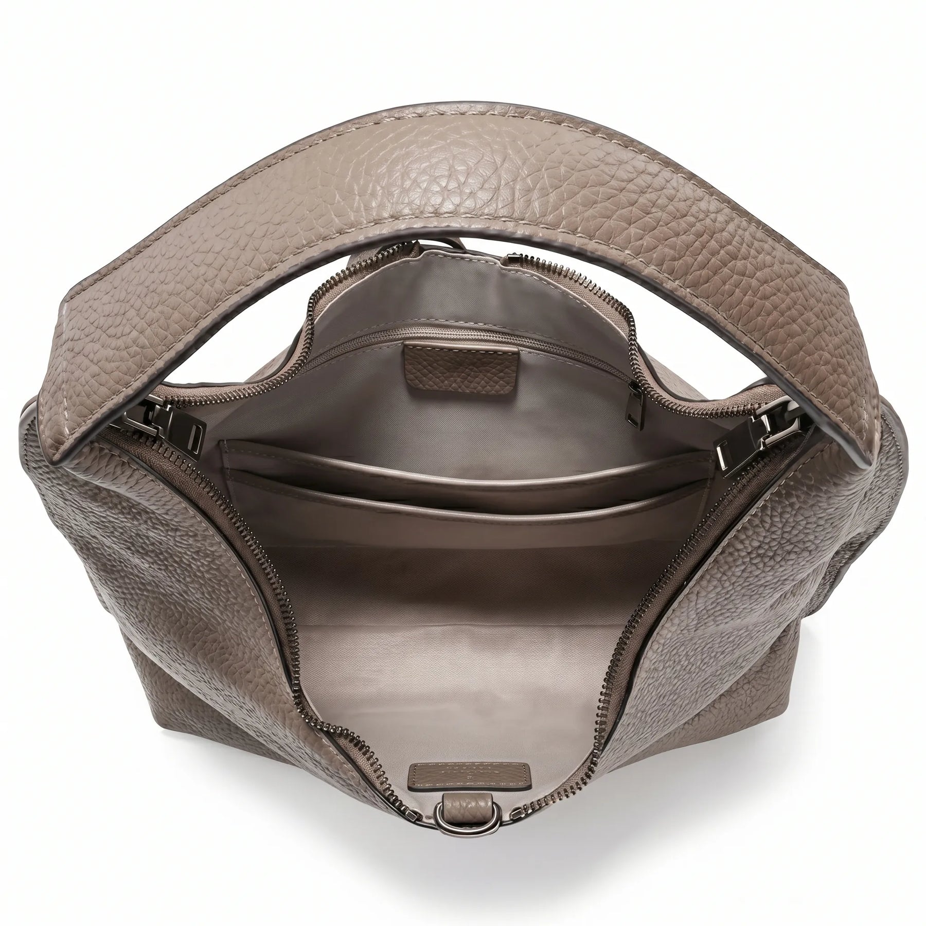 Bolsa tote feminina damasco em couro legítimo em close na textura, costuras e acabamento do material