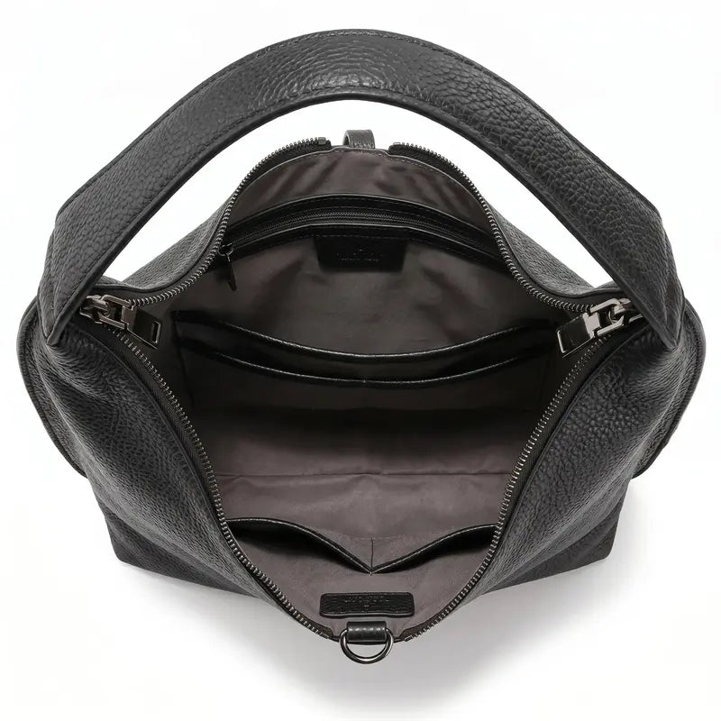 Bolsa tote feminina preta em couro legítimo com forro, zíper e compartimentos internos visíveis
