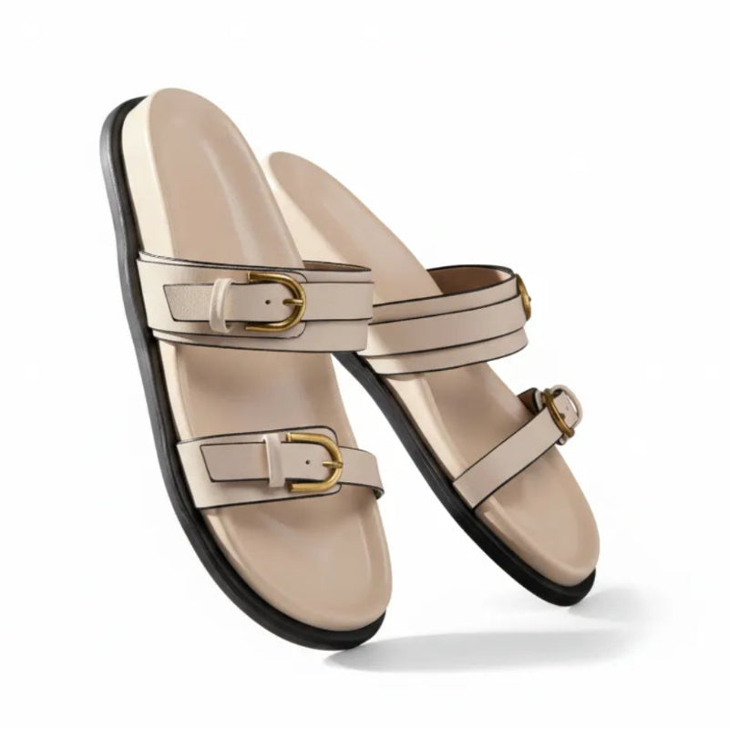 Papete branca com dupla fivela dourada vista de cima mostrando os dois pares.