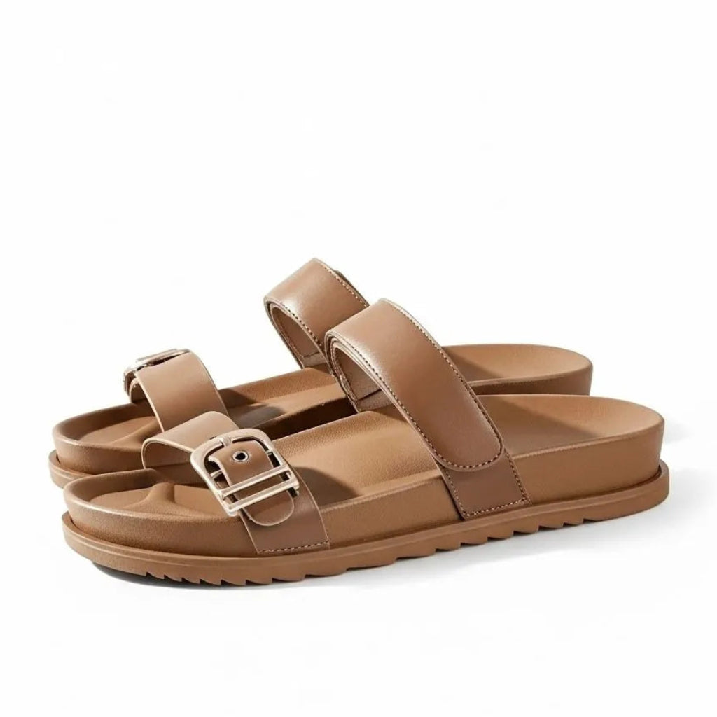 Papete marrom com fivela metálica em angulo superior mostrando o par.